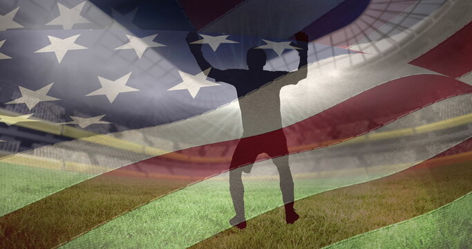Waving us flag over silhouettes of male soccer player in different poses against sports stadium - Powered by Adobe