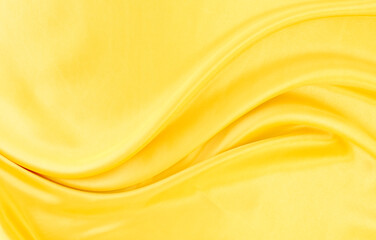Obraz premium yellow gold satin texture that is white silver fabric luxurious shiny that is abstract silk cloth background with patterns soft waves blur beautiful.