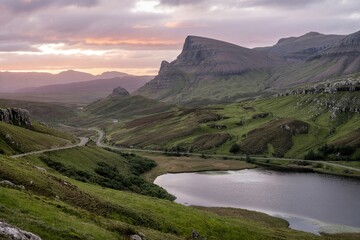 Fototapeta premium Quiraing Mountains In Isle Of Skye At Sunset With Lush Green Landscape