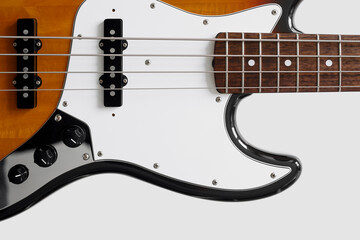 Bass guitar on white background. Music wallpaper