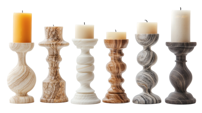 Set of various decorative marble candle holder stands isolated on white background