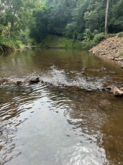 Rio que cruza pelo Camping com muita paz, descanso