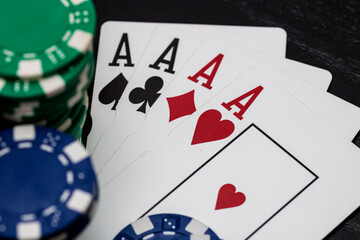 Obraz premium Casino chips and cards on the table. Gambling concept