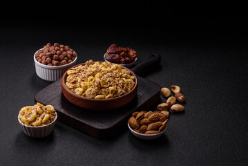 Flakes, chocolate balls and dried fruit for a hearty breakfast