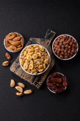 Flakes, chocolate balls and dried fruit for a hearty breakfast