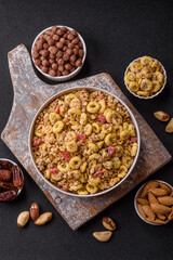 Flakes, chocolate balls and dried fruit for a hearty breakfast