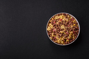 Flakes, chocolate balls and dried fruit for a hearty breakfast