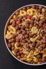 Flakes, chocolate balls and dried fruit for a hearty breakfast