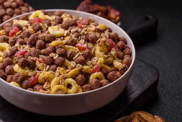 Flakes, chocolate balls and dried fruit for a hearty breakfast