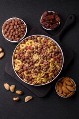 Flakes, chocolate balls and dried fruit for a hearty breakfast