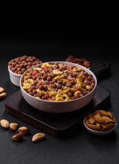 Flakes, chocolate balls and dried fruit for a hearty breakfast