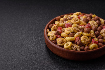 Flakes, chocolate balls and dried fruit for a hearty breakfast