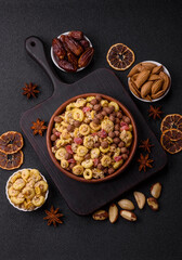 Flakes, chocolate balls and dried fruit for a hearty breakfast