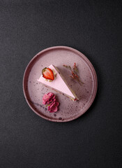 A slice of pink colored puff cake for a birthday celebration