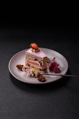 A slice of pink colored puff cake for a birthday celebration