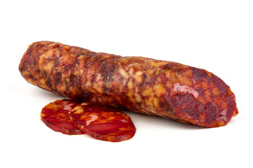 Chorizo sausage, thin cut. Spanish salami, close-up, isolated on white background.