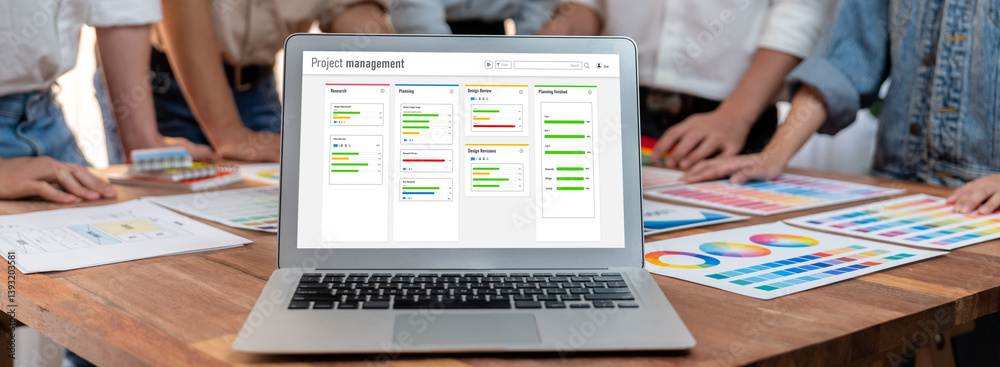 Fototapete project planning software for brisk business project management on the computer screen showing timel
