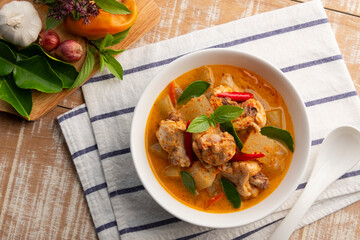 Red Curry with Winter melon and Chicken in a bowl.Thai spicy food.Top view.