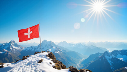 Swiss flag waving atop snowy mountain, celebration of achievement