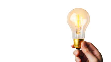 Hand holds lightbulb against black background, cut out transparent