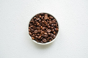 moistened local cultural coffee beans on a rotating background in close-up