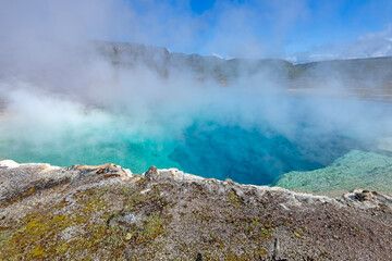 Steam on Eerie Blue Waters in a Hot Spring