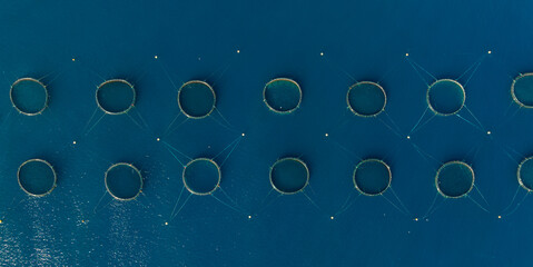 Drone aerial view of tuna rungs in Mediterranean sea. Tuna fish farm