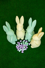 Easter.Four colorful rabbits and colorful eggs and free space