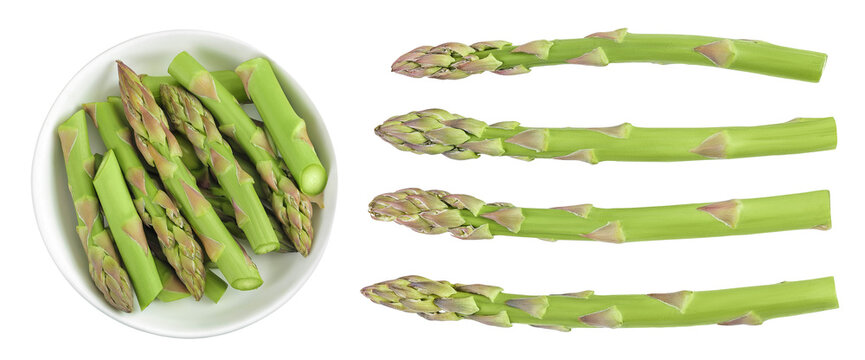 fresh asparagus in ceramic bowl isolated on white background. Top view. Flat lay.