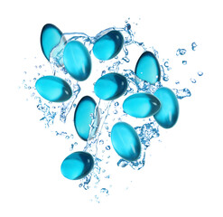 Many pills and splashes of water in air on white background