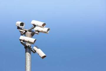 Six security cameras on pole. Video surveillance. CCTV cameras.
