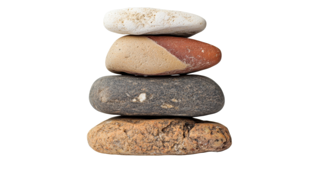 Stack of zen stones balanced on black background, cut out transparent