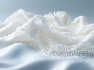 Close up view of foamy bubbles covering white fabric