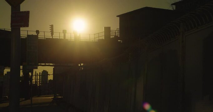 Afternoon Sun Flashing Through Windows of Elevated Subway Train