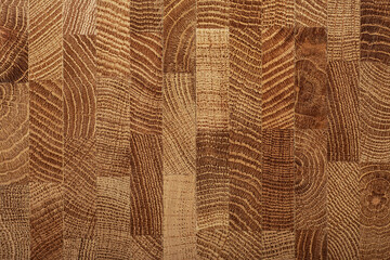 Texture of wooden board as background, top view. Natural durable end grain hardwood cutting board.