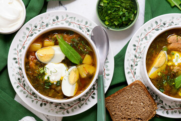 Traditional Ukrainian green borscht with sorrel.style rustic
