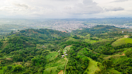 Aerial View of Popayán, Colombia: Lush Green Hills and City Landscape