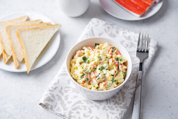 Imitatiom crab meat mayonnaise salad in a bowl