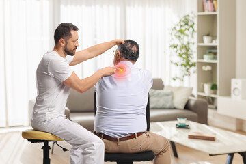 Chiropractor treating misalignments of joints