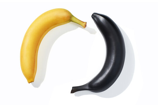 Yellow and black banana isolated on white background