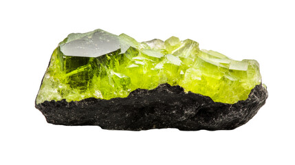 Vivid olivine crystal, perched on dark matrix, raw geology, cut out transparent