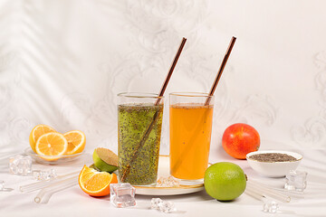Diet vegan cocktail with chia seeds, orange, lime, violet and ice. Detox diet and weight loss concept. Summer party and healthy lifestyle advertising. Summer banner and screen template.