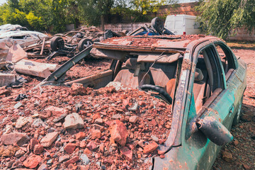 Damaged civilian car after missile strike. War in Ukraine