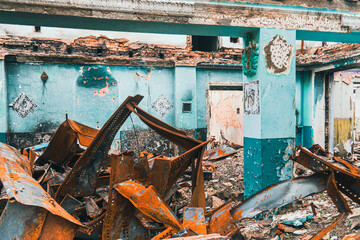 View from inside the house destroyed by shelling. War in Ukraine