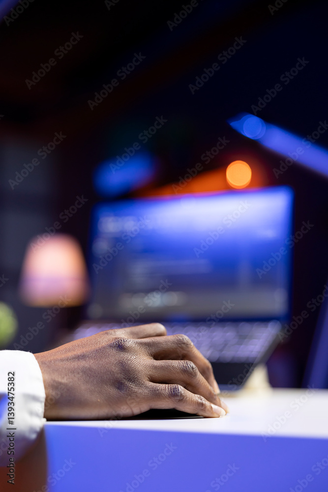 Poster teleworker in living room office using laptop to do coding for software developing. remote employee 