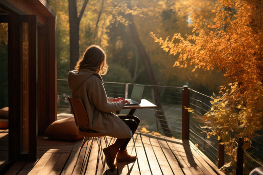 Digital nomad lifestyle. Woman working on a laptop while traveling. Career and personal life. Finding a healthy balance between work and personal life