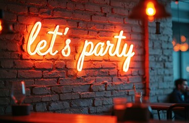 Neon sign reads Lets Party on brick wall. Warm orange glow illuminates the message. Drinks and people in background suggest celebration event. Ideal for nightlife promo, party invitations.