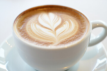 Perfectly Poured Cappuccino Isolated on Bright White Background