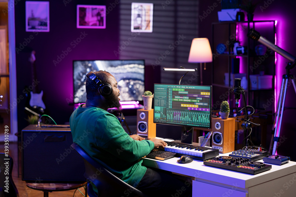 Poster Audio producer playing piano electronic synthesizer to create a new tune, adjusting volume levels on old recordings. Music engineer recording sounds, plays tracks on midi controller.