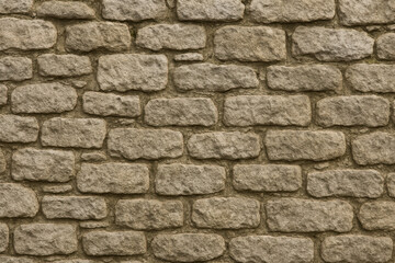 Fototapeta premium Seamless Old Stone Wall Texture with Natural Rock Patterns and Subtle Weathering, Flat Top-Down View, Neutral Gray or Beige Tones, Ideal for Historical, Rustic, or Architectural Background Designs